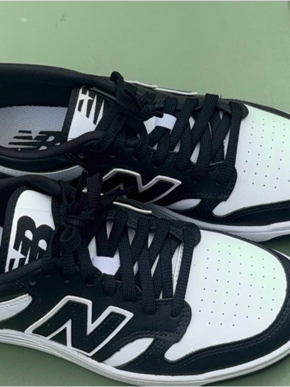 New Balance Men’s Black & White Low-Top Sneakers